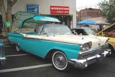 Photo of Vintage 1959 Ford Galaxie Flip-Top Convertible Showing Top Folding into Trunk
